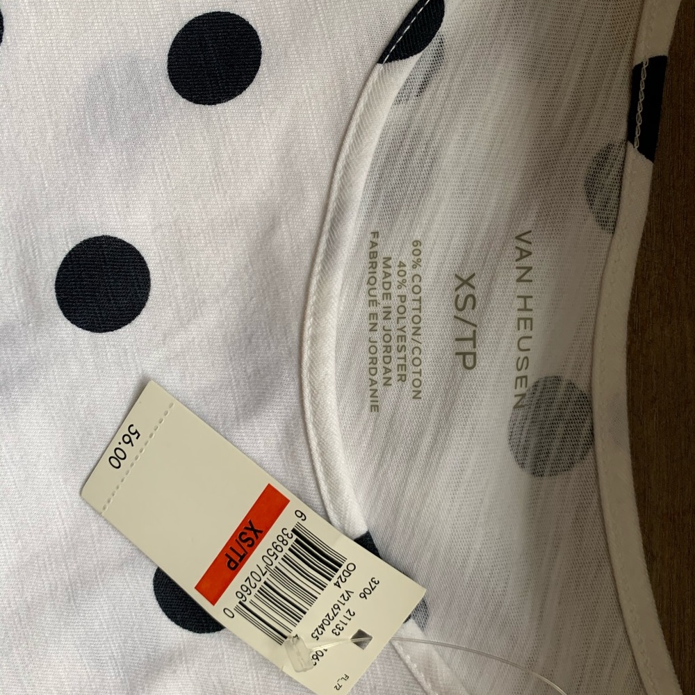 Polka dot blouse.